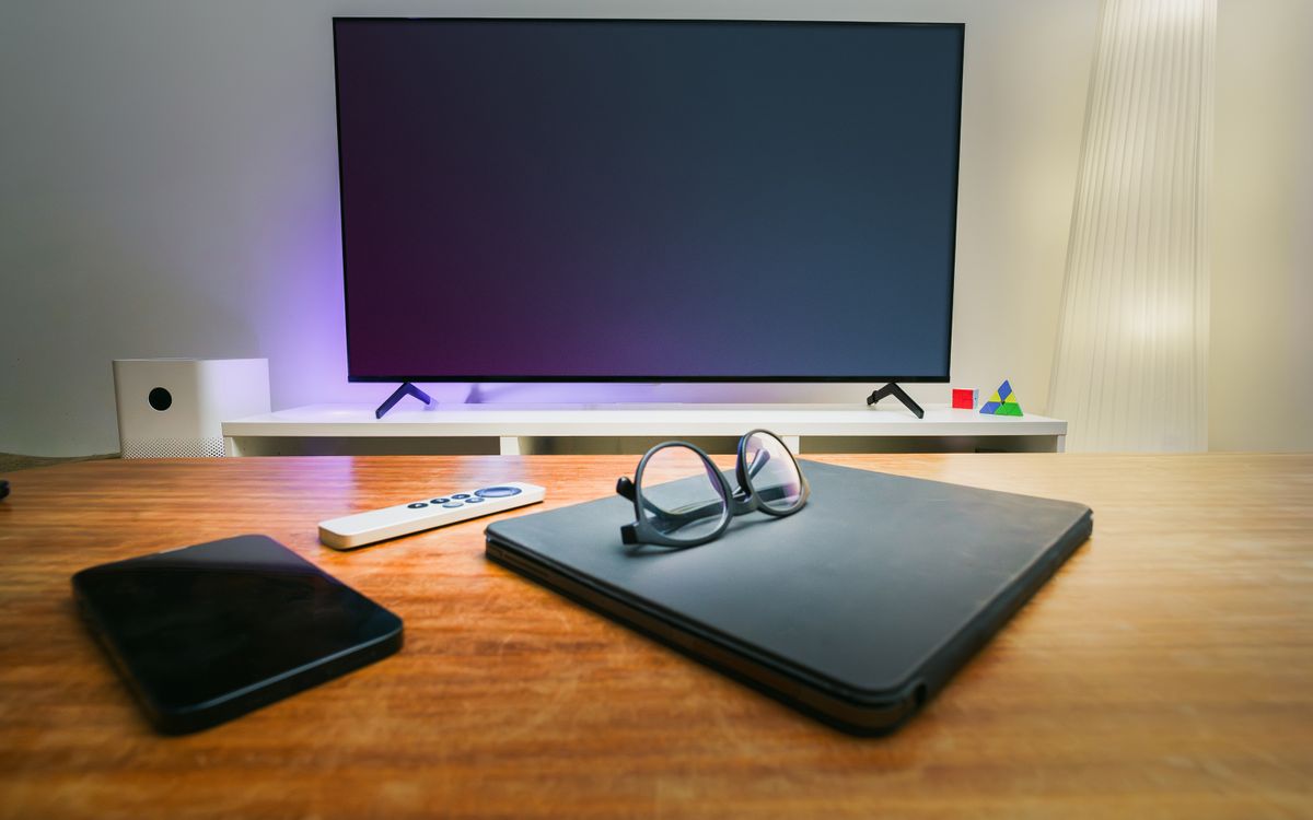 A modern living room equipped with digital entertainment devices